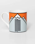 Mug with mountain design on an orange background, featuring the famous 21 hairpins of Alpe D'Huez