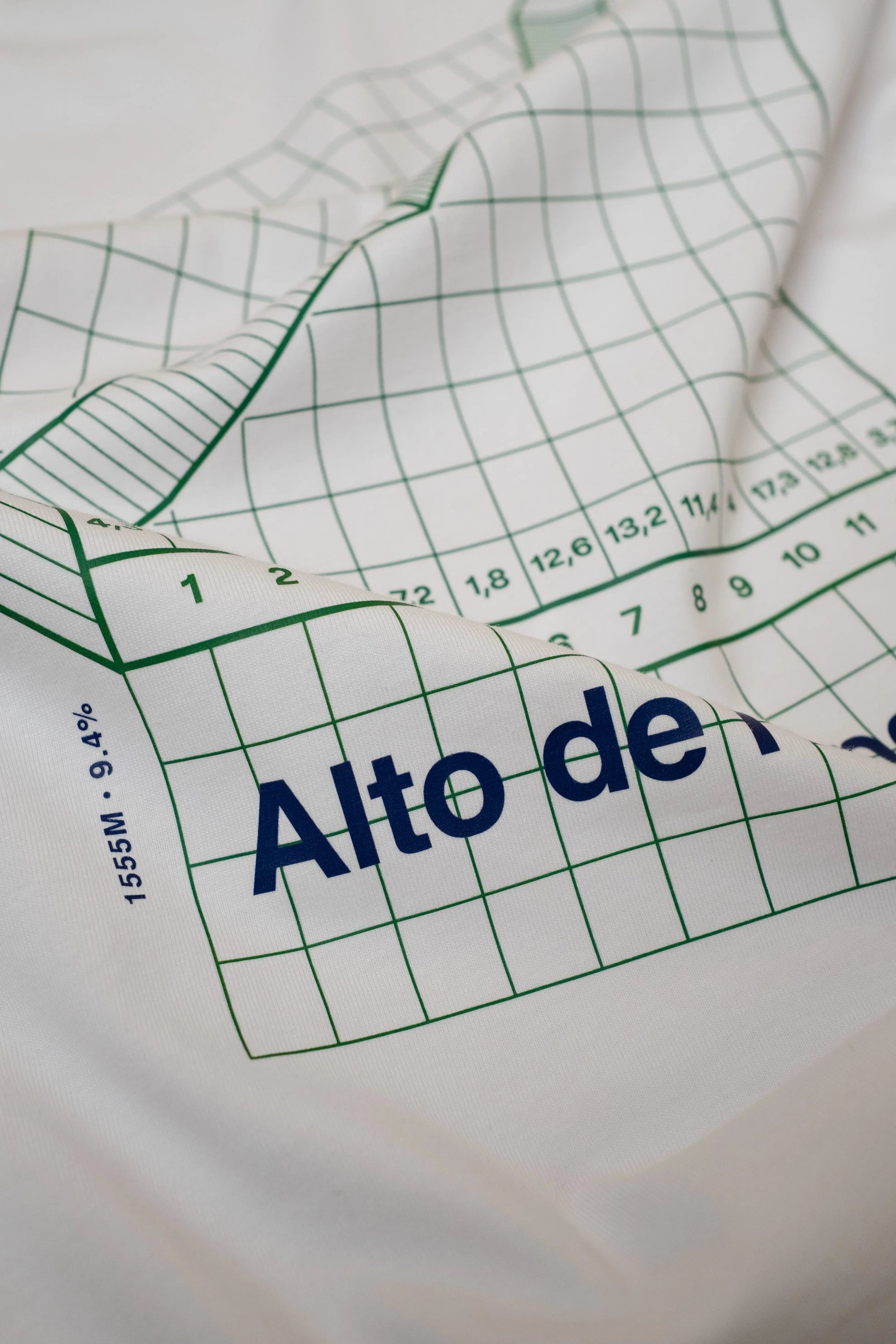 White Climb Profiles t-shirt with Spanish cycling climb 'Alto d'Angliru' graphic. By The Handmade Cyclist.