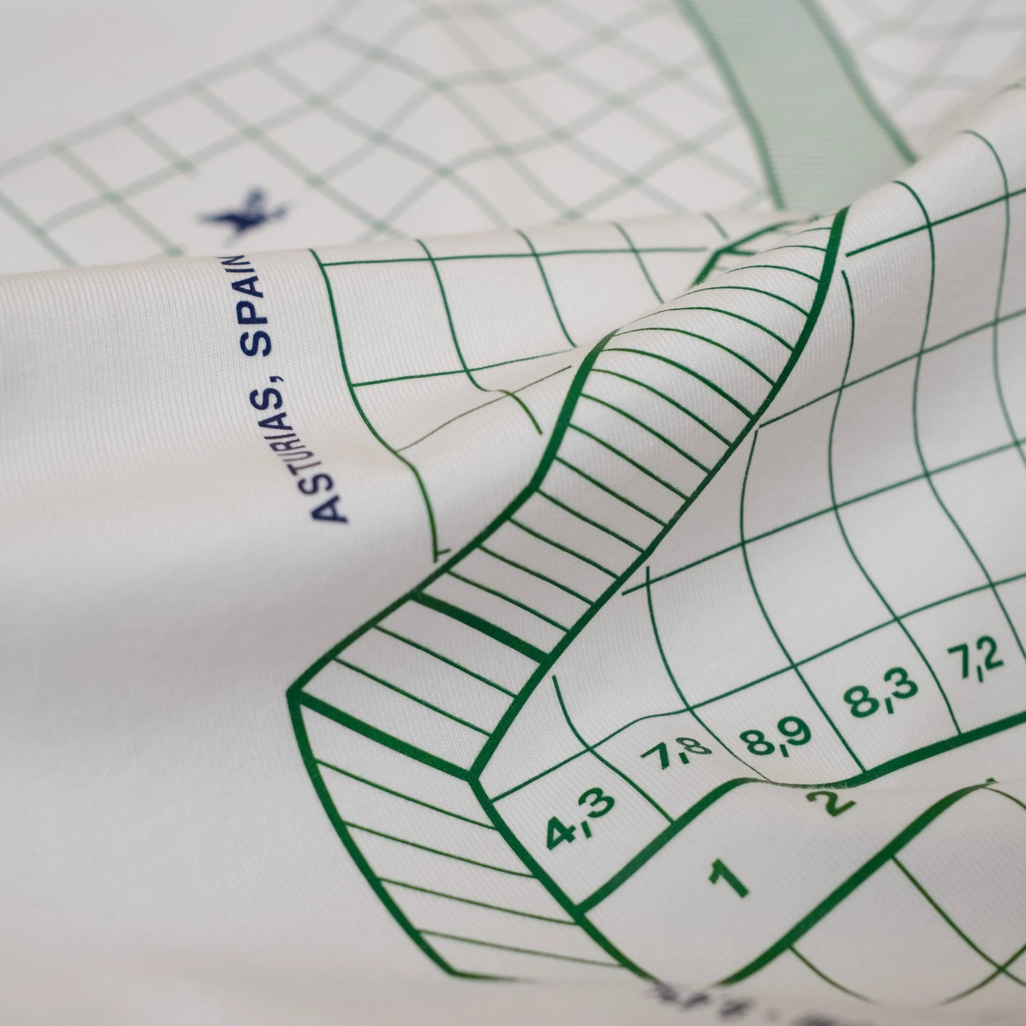 White Climb Profiles t-shirt with Spanish cycling climb 'Alto d'Angliru' graphic. By The Handmade Cyclist.