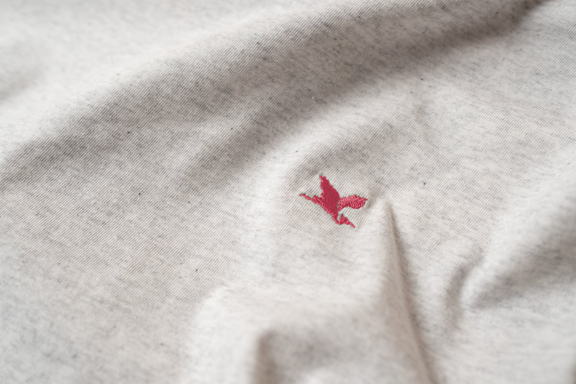 Pink embroidered Heron emblem, by The Handmade Cyclist