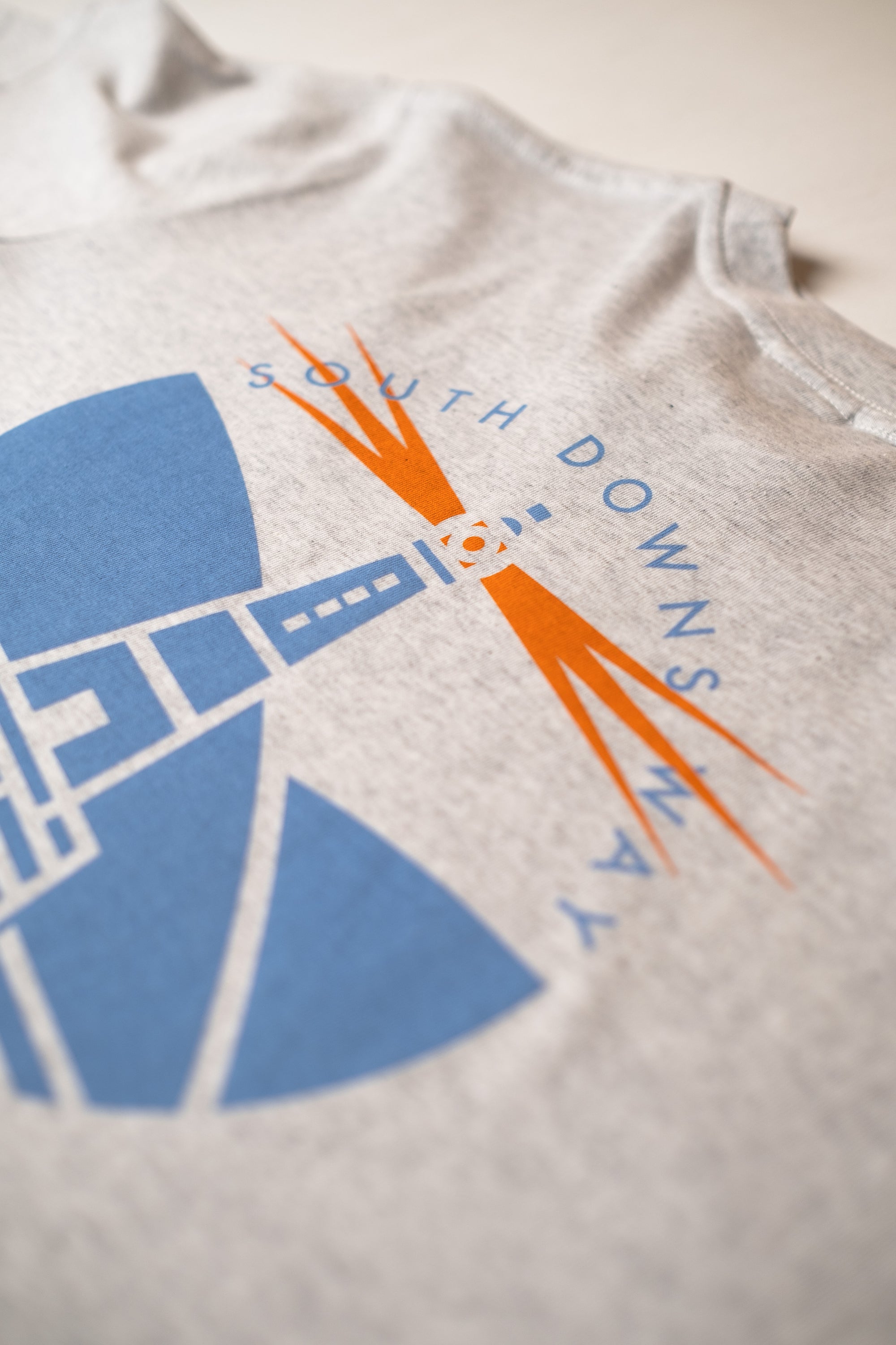 Close-up of a cycling t-shirt with South Downs Way print design by The Handmade Cyclist.