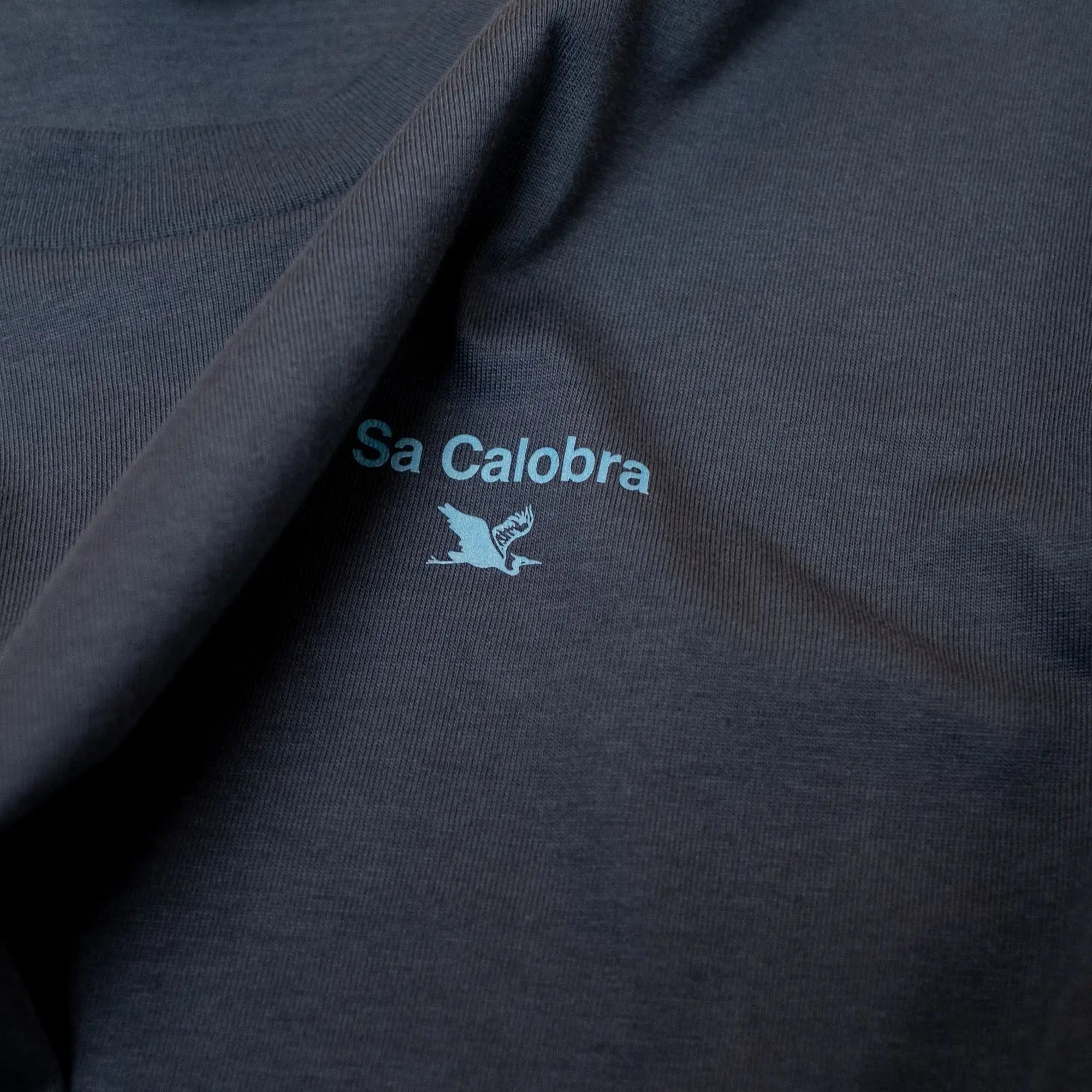 Navy Blue Climb Profiles t-shirt with Majorca's cycling climb Sa Calobra logo, by The Handmade Cyclist.