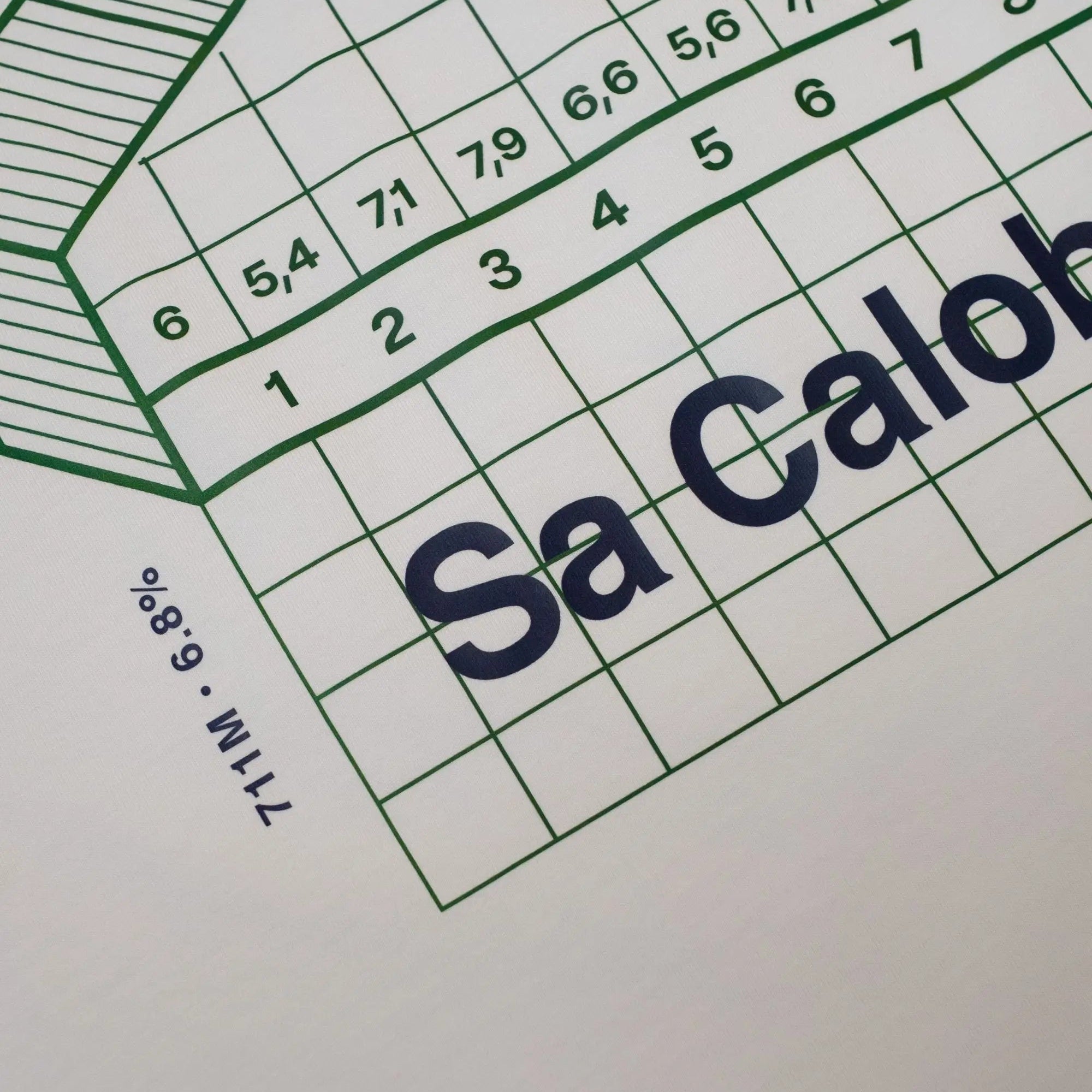 Close-up of white Climbs Profiles T-shirt with cycling climb 'Sa Calobra' graphic, by the Handmade Cyclist