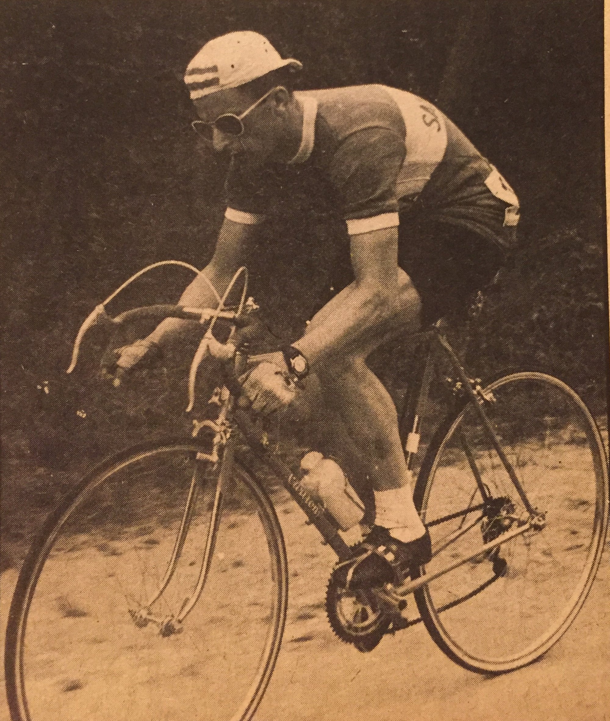 Vintage photograph of cyclist Tommy Simpson in action.