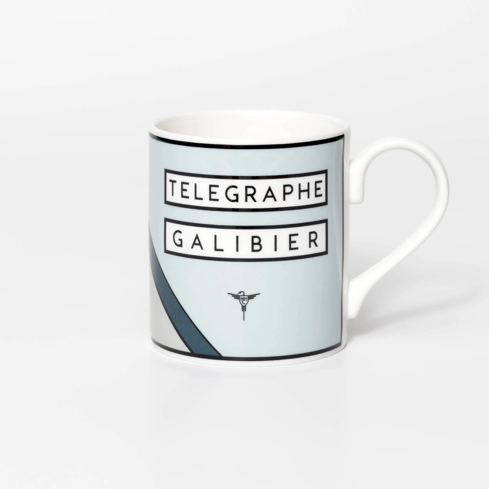 Mug with famous cycling destination mountain and tower design on a white background