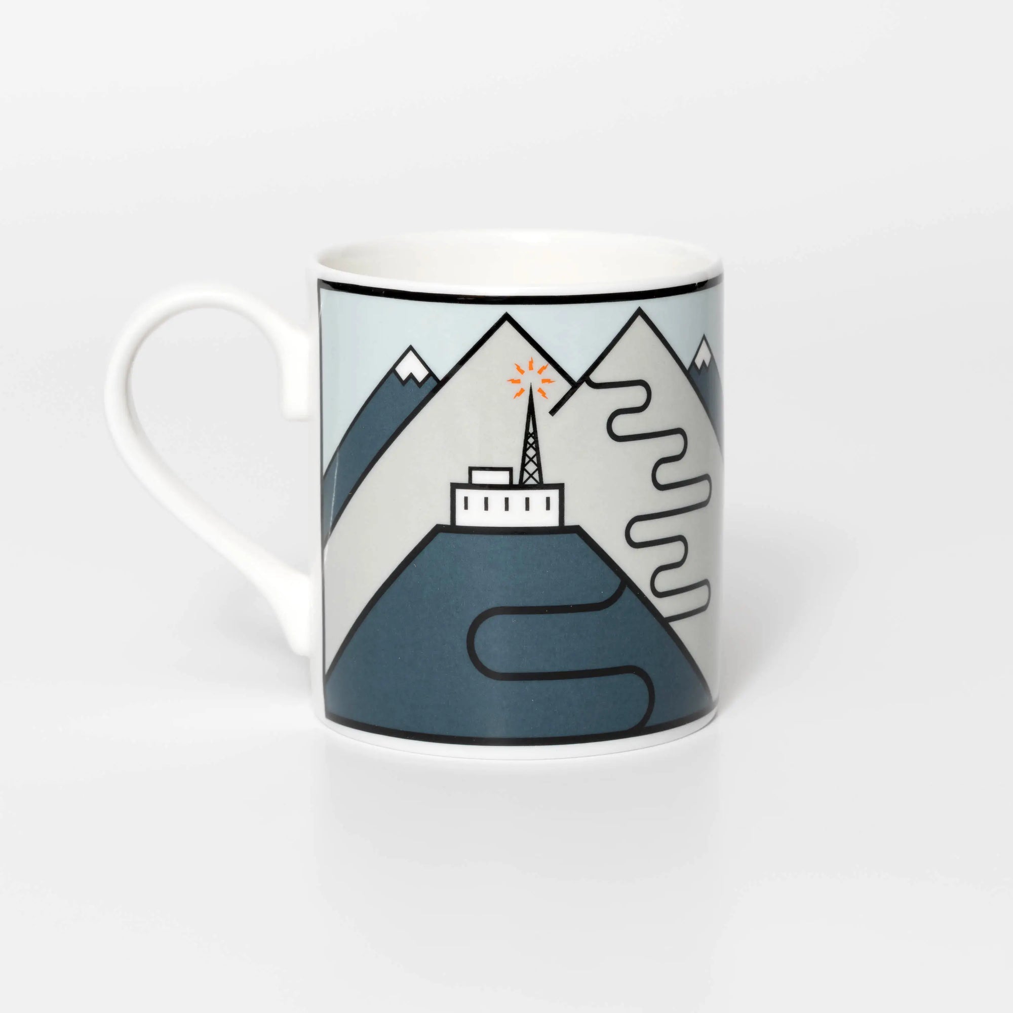 Mug with famous cycling destination mountain and tower design on a white background